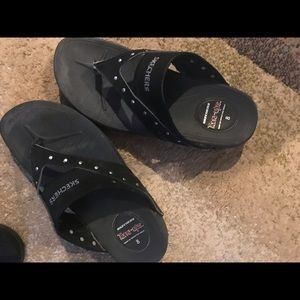 Skechers shape ups size 8. - black in color